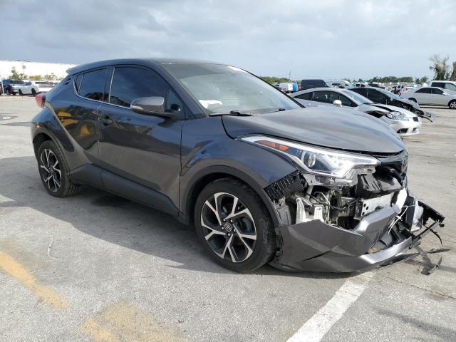 NMTKHMBX8KR074574 - 2019 TOYOTA C-HR XLE GRAY photo 4