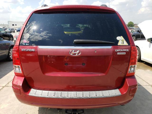 KNDMC233976020068 - 2007 HYUNDAI ENTOURAGE GLS RED photo 6