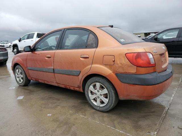 KNADE223596571710 - 2009 KIA RIO BASE ORANGE photo 2