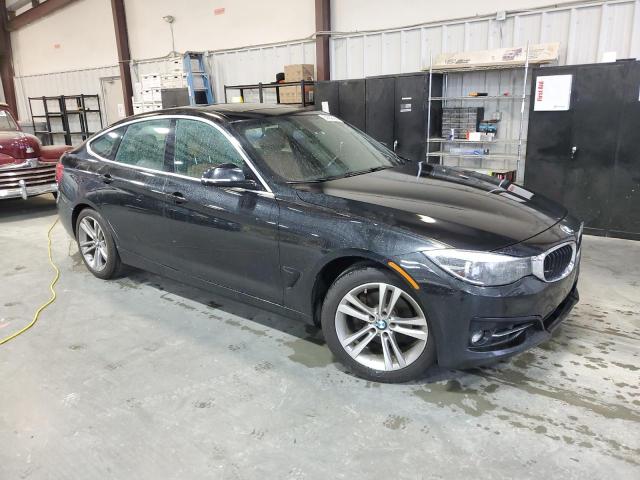 WBA8Z9C35HG827494 - 2017 BMW 330 XIGT BLACK photo 4