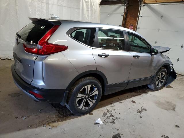 2HKRW6H36JH229648 - 2018 HONDA CR-V LX SILVER photo 3