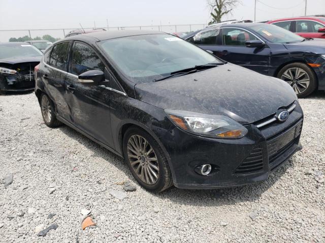 1FAHP3N28CL214740 - 2012 FORD FOCUS TITANIUM BLACK photo 4