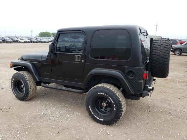 1J4FA59S14P770689 - 2004 JEEP WRANGLER SAHARA BLACK photo 2