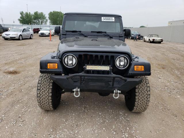 1J4FA59S14P770689 - 2004 JEEP WRANGLER SAHARA BLACK photo 5