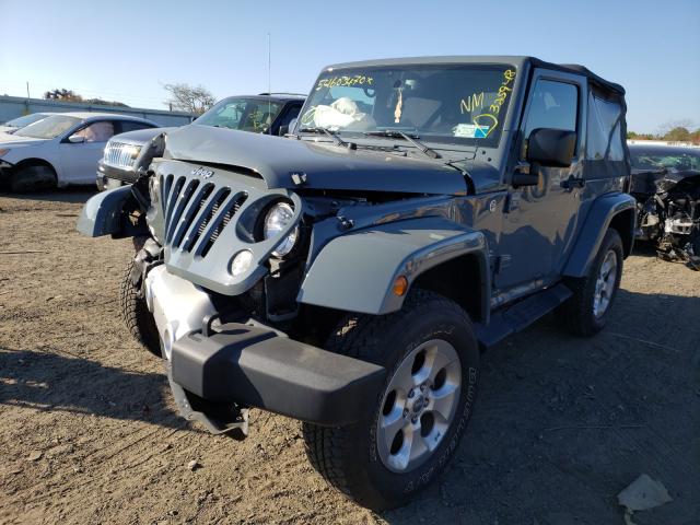 1C4AJWBG4EL325948 - 2014 JEEP WRANGLER SAHARA GRAY photo 2