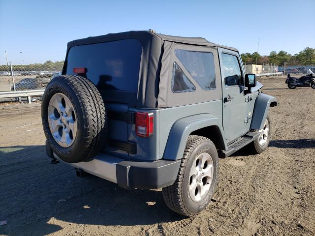 1C4AJWBG4EL325948 - 2014 JEEP WRANGLER SAHARA GRAY photo 4