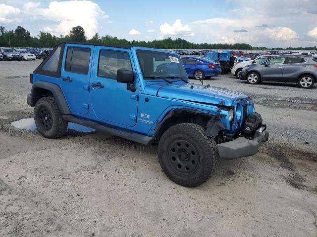 1J4GA39179L786720 - 2009 JEEP WRANGLER U X BLUE photo 4