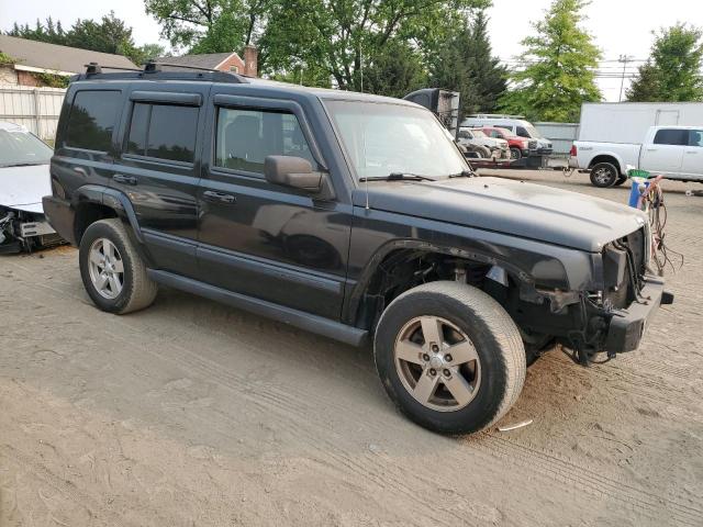 1J8HG48K97C546034 - 2007 JEEP COMMANDER BLACK photo 4