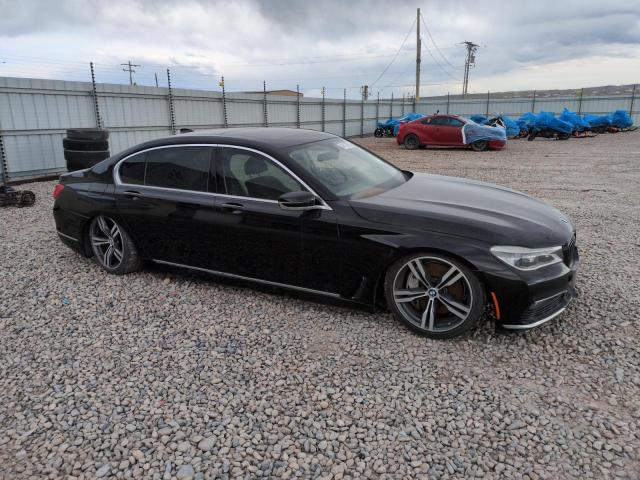 WBA7F0C35HGM21697 - 2017 BMW 750 I BLACK photo 4