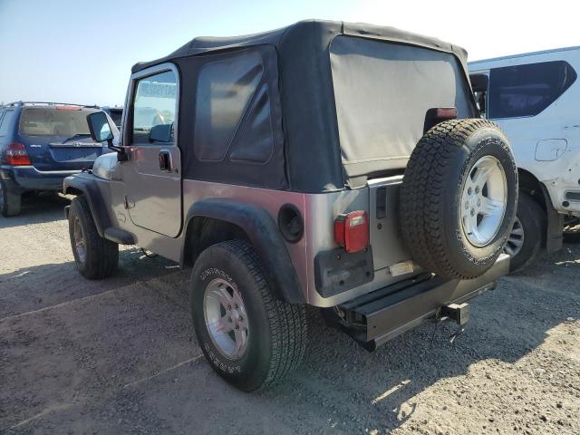 1J4FA49S4YP720899 - 2000 JEEP WRANGLER / SPORT GRAY photo 2