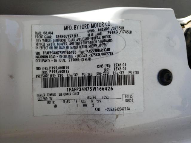 1FAFP34N75W166426 - 2005 FORD FOCUS ZX4 WHITE photo 12