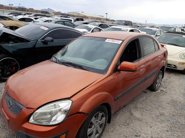 KNADE223296543069 - 2009 KIA RIO BASE ORANGE photo 1