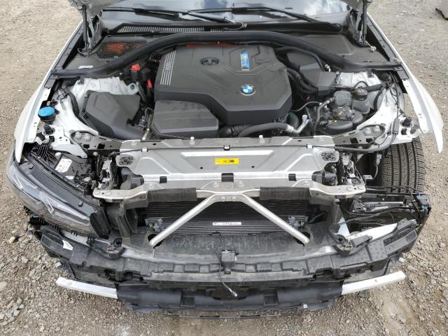 3MW39FS04P8D23287 - 2023 BMW 330XE Белый фото 11