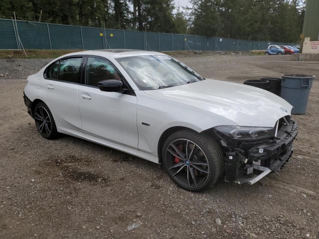 3MW39FS04P8D23287 - 2023 BMW 330XE Белый фото 4
