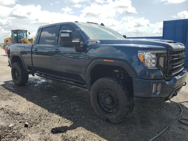 1GT49PEY9MF211652 - 2021 GMC SIERRA K2500 AT4 BLUE photo 4