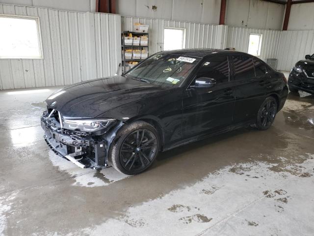 3MW5R7J02N8C77472 - 2022 BMW 330XI BLACK photo 1