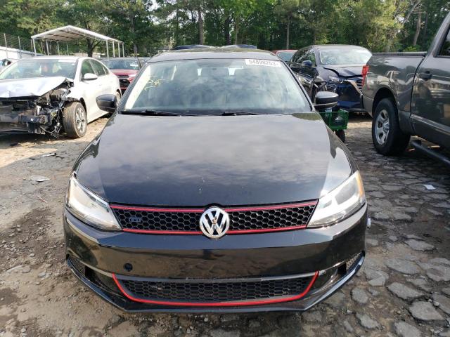 3VW2K7AJ5EM314831 - 2014 VOLKSWAGEN JETTA BASE Schwarz Foto 5