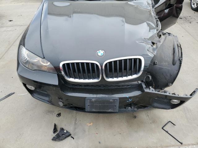 5UXFG2C56E0H11218 - 2014 BMW X6 XDRIVE35I BLACK photo 11