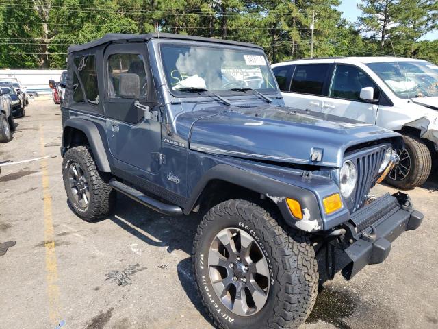 1J4FA49S62P705702 - 2002 JEEP WRANGLER / SPORT BLUE photo 4