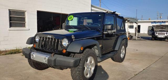 1J4FA54178L589768 - 2008 JEEP WRANGLER SAHARA BLACK photo 2