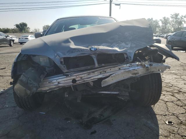 WBAAZ33494KP86902 - 2004 BMW 325 IS SULEV GRAY photo 5