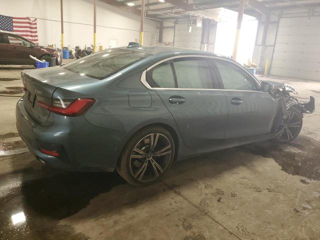 3MW5R7J08M8C21499 - 2021 BMW 330XI BLUE photo 3