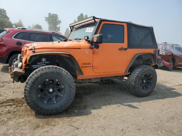 1C4AJWAG1CL128721 - 2012 JEEP WRANGLER SPORT ORANGE photo 1