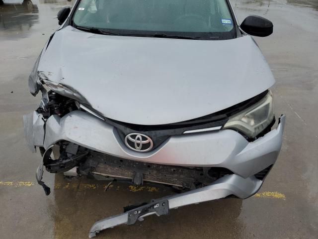 2T3ZFREV2GW305553 - 2016 TOYOTA RAV4 LE SILVER photo 12