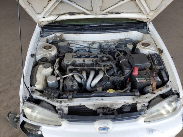 1Y1SK5485YZ421828 - 2000 CHEVROLET GEO PRIZM BASE WHITE photo 11