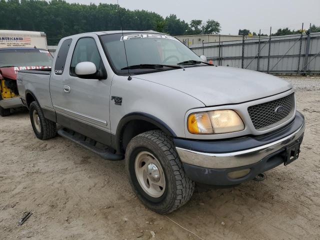 1FTRX18L9YNA94255 - 2000 FORD F-150 SILVER photo 4