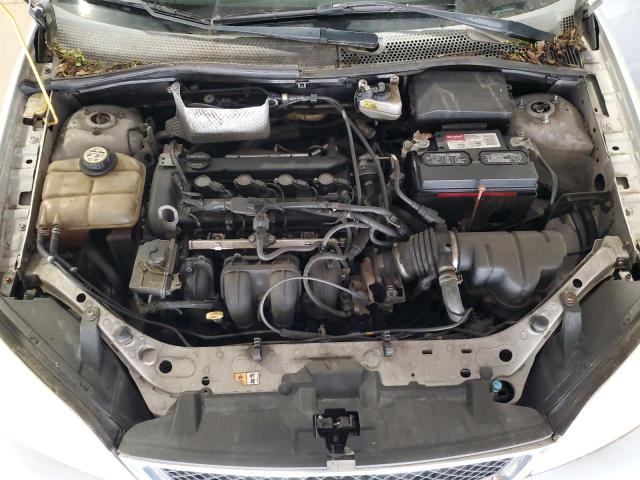 1FAFP34NX7W203519 - 2007 FORD FOCUS ZX4 SILVER photo 11