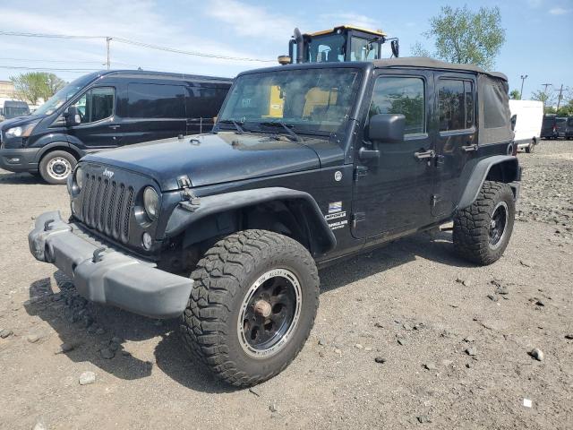 1C4BJWDG1FL609850 - 2015 JEEP WRANGLER U SPORT BLACK photo 1