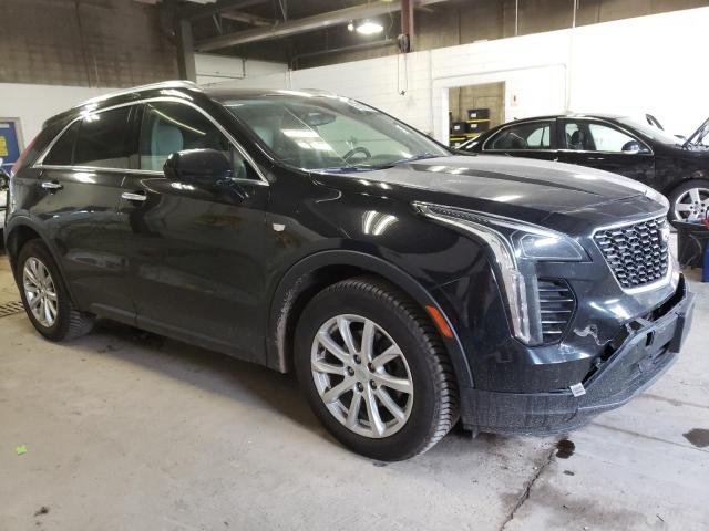 1GYFZBR45KF136975 - 2019 CADILLAC XT4 LUXURY BLACK photo 4