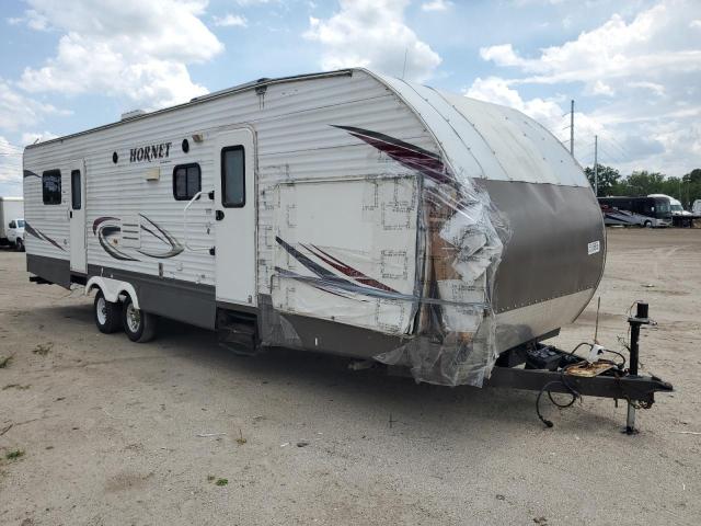 4YDT32B27A7203410 - 2010 KEYSTONE HORNET WHITE photo 1