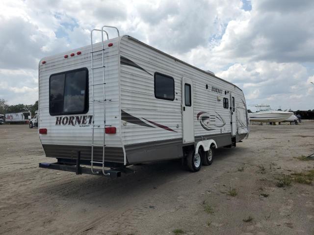 4YDT32B27A7203410 - 2010 KEYSTONE HORNET WHITE photo 4