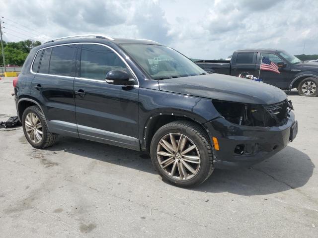 WVGAV3AX0EW548308 - 2014 VOLKSWAGEN TIGUAN S BLACK photo 4