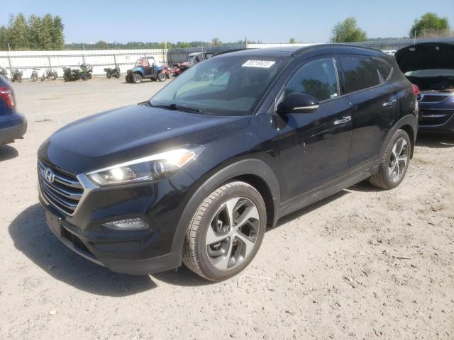 KM8J3CA2XGU091886 - 2016 HYUNDAI TUCSON LIMITED BLACK photo 1