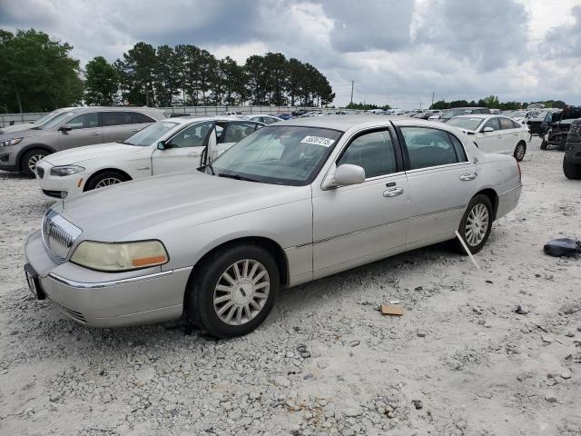 1LNHM81WX4Y669873 - 2004 LINCOLN TOWN CAR EXECUTIVE ვერცხლისფერი ფოტო 1