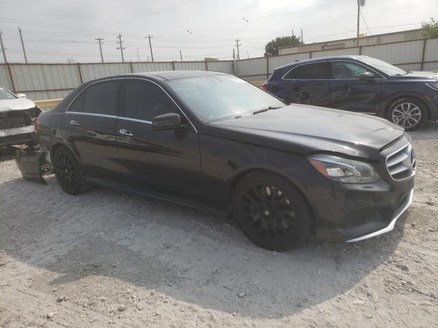 WDDHF9BB9EA905851 - 2014 MERCEDES-BENZ E 550 4MATIC BLACK photo 4