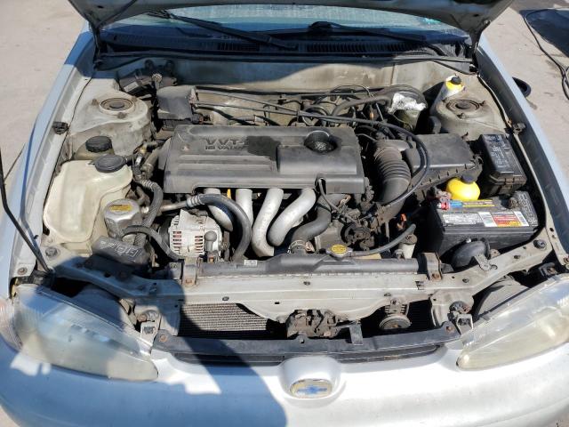 1Y1SK5487YZ403265 - 2000 CHEVROLET GEO PRIZM BASE SILVER photo 11