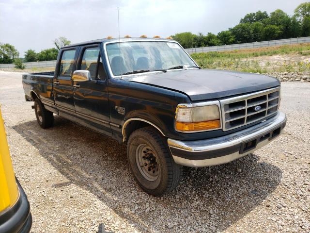 1FTJW35FXVEA99163 - 1997 FORD F350 GREEN photo 4