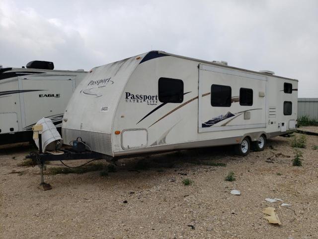 4YDT2902096411077 - 2009 KEYSTONE PASSPORT WHITE photo 2