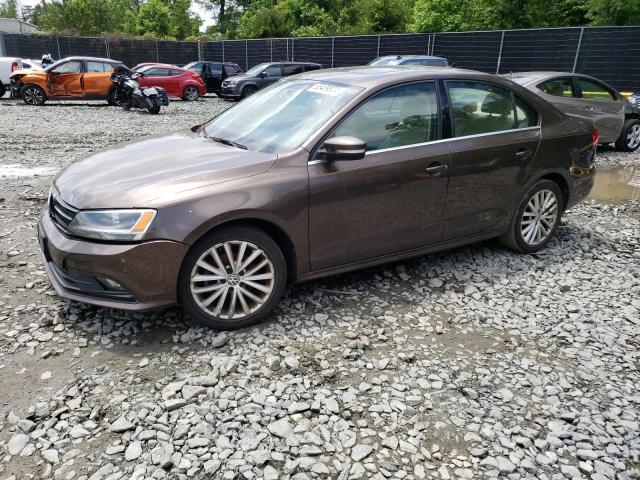 3VWD17AJXFM246944 - 2015 VOLKSWAGEN JETTA SE BROWN photo 1