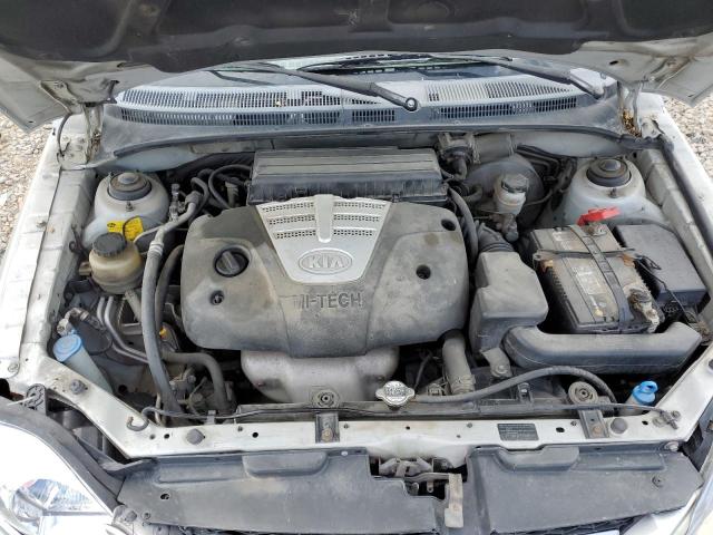 KNADC125556365041 - 2005 KIA RIO SILVER photo 7