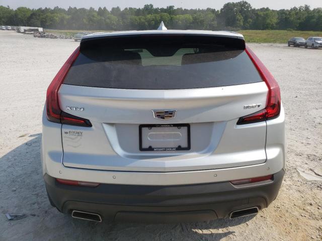 1GYAZAR48MF013324 - 2021 CADILLAC XT4 LUXURY SILVER photo 6