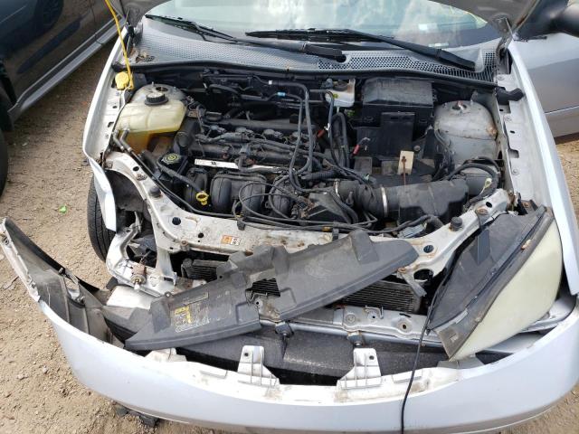 1FAFP34NX7W142995 - 2007 FORD FOCUS ZX4 SILVER photo 11