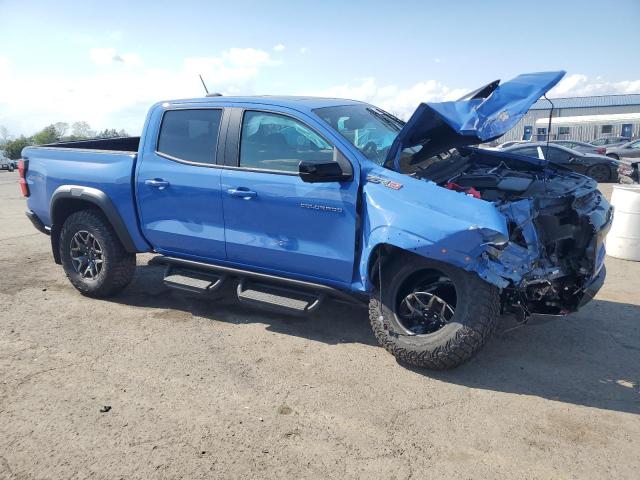 1GCPTFEK0S1132997 - 2025 CHEVROLET COLORADO ZR2 BLUE photo 4