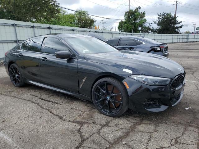 WBAGV8C02NCK08667 - 2022 BMW M850XI BLACK photo 4