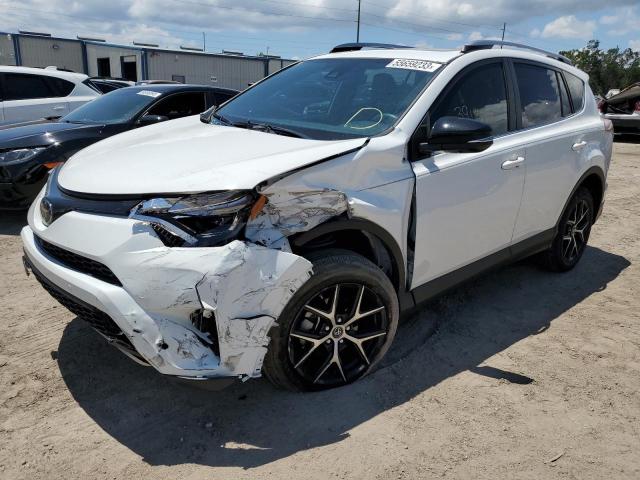 JTMNFREV4JJ177658 - 2018 TOYOTA RAV4 SE WHITE photo 1