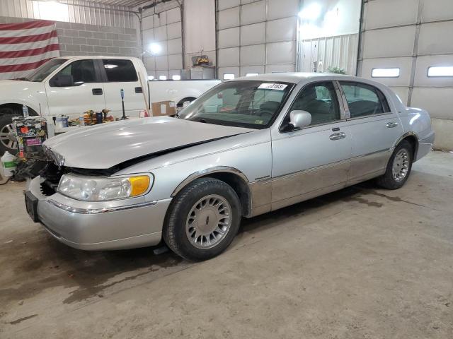 1LNHM83W0XY714062 - 1999 LINCOLN TOWN CARTIER SILVER photo 1